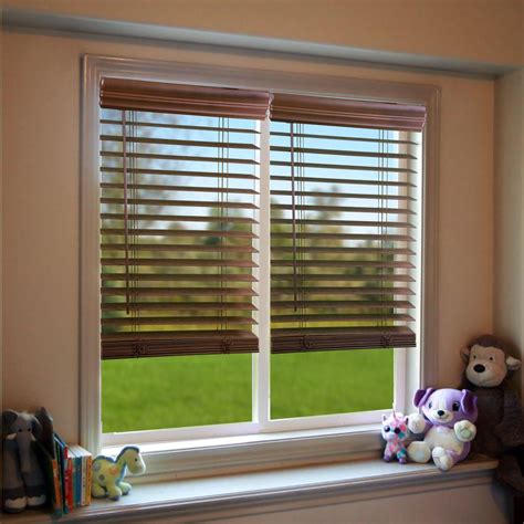 Vinyl blinds are resistant to heat and moisture, and are perfect for kitchens, bathrooms, and garages. . Home depot venetian blinds